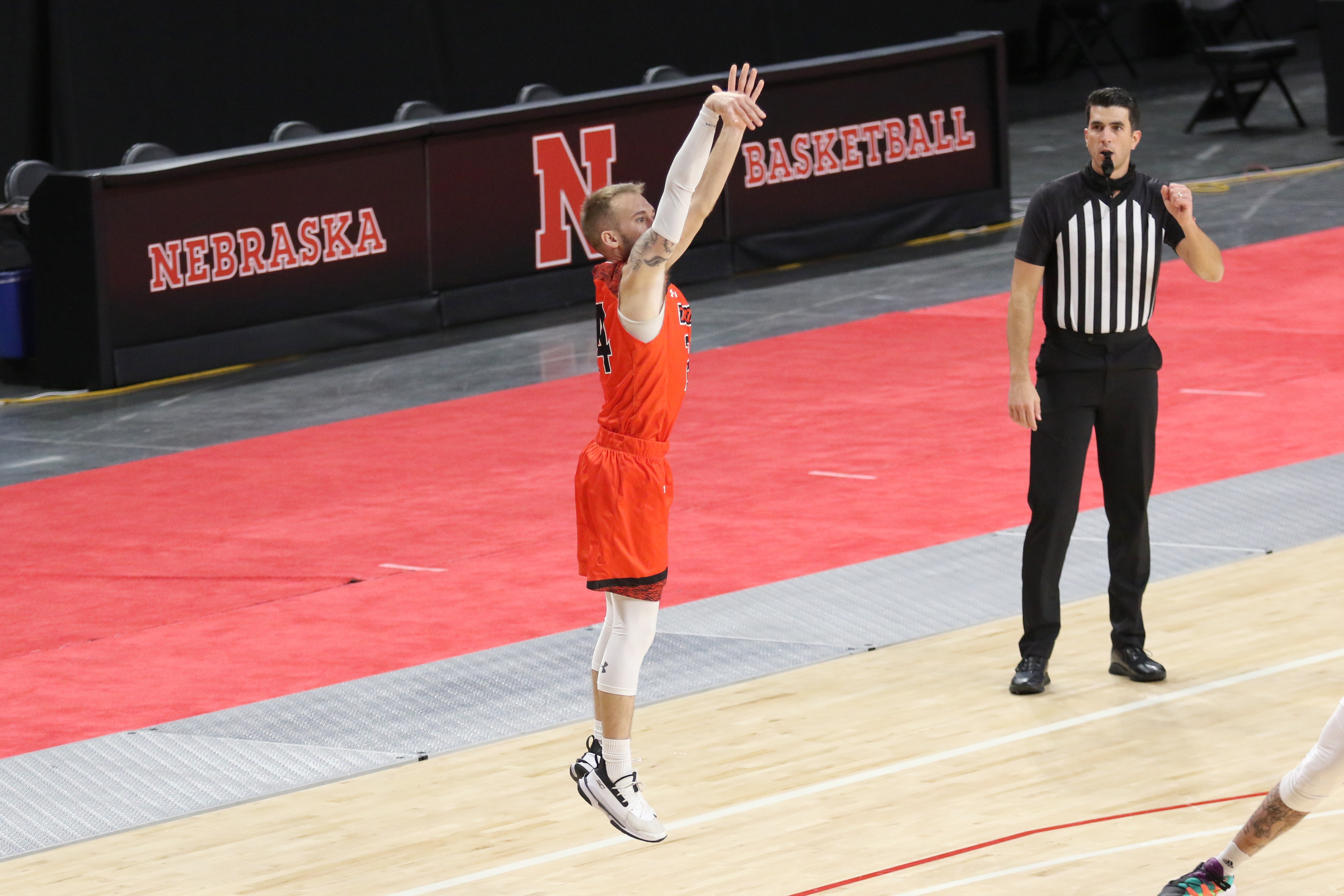 Trey shooting a three-pointer in college